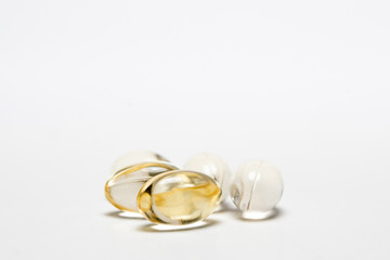 Pills over white background.