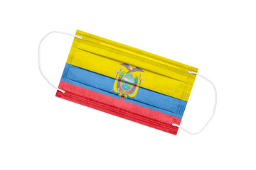 Medical mask with flag of Ecuador isolated on a white background. Ecuador pandemic concept. Coronavirus outbreak attribute in Ecuador. Medicine in Ecuador.