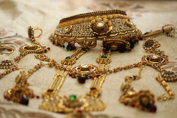 gold necklace and earrings