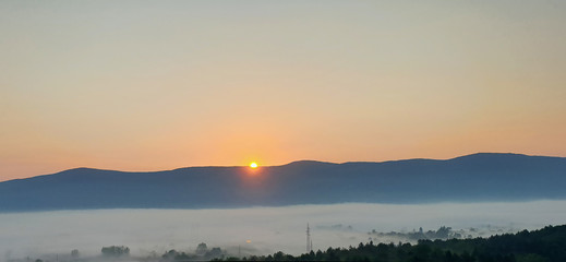 Neighborhood in the fog at sunrise, autobahn shot