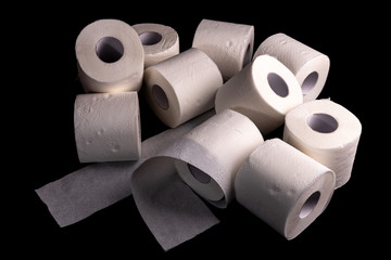 toilet paper isolated on black