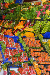 Fresh and organic fruits at farmers market. Colorful and varied mix of legumes, veggie and fruits