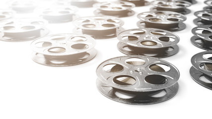 3D rendering of movie reels on a white surface