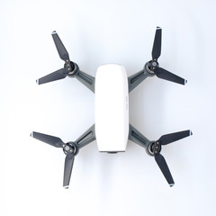 Closeup modern  white Drone helicopter with a full HD camera, A Professional Quadcopter isolated on white background, overlight
 - obrazy, fototapety, plakaty