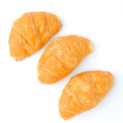 Closeup France croissant bread isolated on white background, top view of healthy bakery 