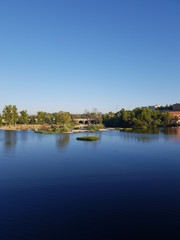 Fototapeta na wymiar Landscape with river in the morning. Paisaje con rio en la mañana
