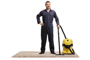 Janitor hoovering a carpet