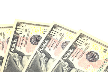 Ten dollar bills isolated on white background close-up