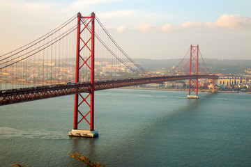 View of 25th of April Bridge, a suspension bridge connecting the city of Lisbon, capital of Portugal, to the municipality of Almada on the left (south) bank of the Tagus river. Lisbon, Portugal