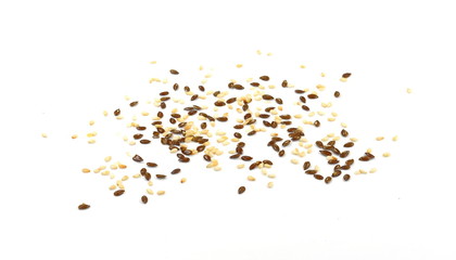 Organic Linseed or Flaxseed (Linum usitatissimum)  and sesame isolated on white background.