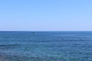 Obraz premium Blue Mediterranean sea horizon in a sunny day in Chania, Crete Island, Greece.