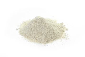 Pile of integral spelt wheat flour isolated on white background
