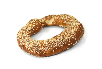 tasty bagel with sesame seed on white background