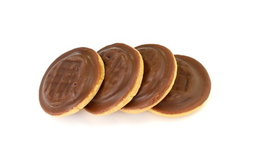 Chocolate coated biscuit cakes with the orange filling isolated over the white background.