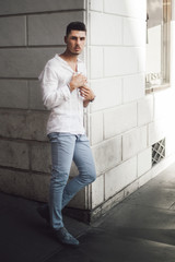 Obraz premium Nice boy posing in Rome during a sunny day untile the sunset