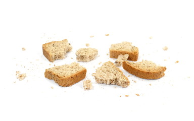 Bread crumbs, wholemeal bread isolated on a white background. leftover bread.