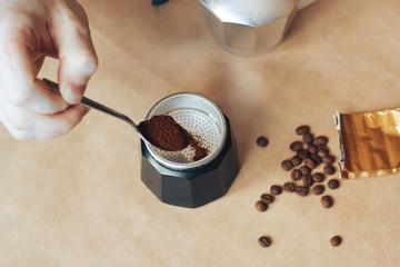 The process of making coffee in the geyser coffee maker.