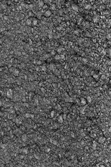 Surface grunge rough of asphalt, Seamless tarmac dark grey grainy road, Texture Background. Fresh new Smooth asphalt road. The texture of the tarmac. Abstract background. Monochrome texture.