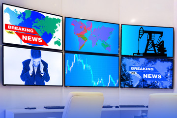 Monitoring what is happening. Concept - monitoring of television news. Concept - tracking global trends. Socialogy. News from various fields on monitors. Several monitors are hanging on the wall.