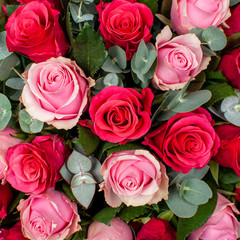 Bouquet of flowers from red and pink roses. 