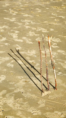 Stumps for a game of cricket on the beach