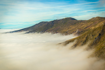 Fototapeta na wymiar Mountains above the Clouds