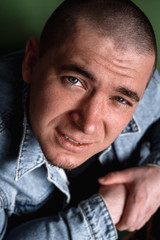 the guy is looking at the top. long eyelashes . beautiful eyes. close-up. portrait