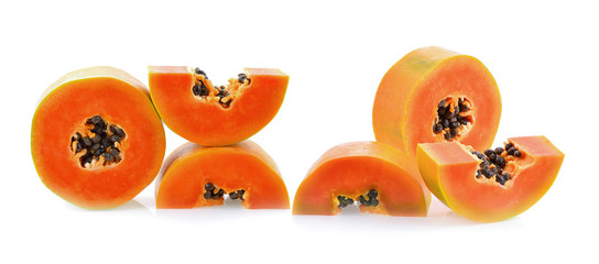 Papaya slices on white background
