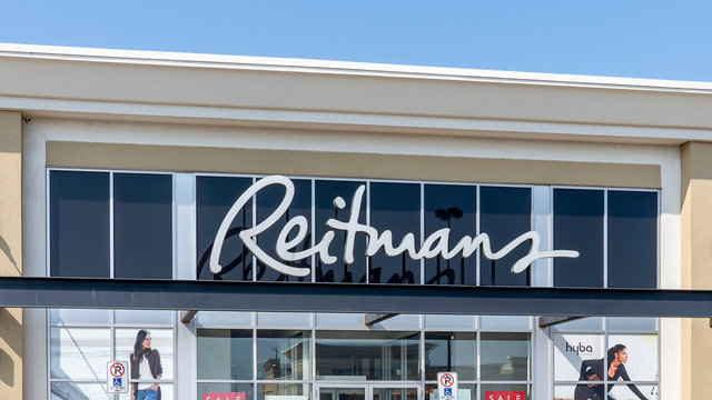 Oakville, Ontario, Canada - July 25, 2019: A Reitmans store sign in Oakville, Ontario, Canada. Reitmans Ltd. is a Canadian retailing company, specializing in women's clothing.