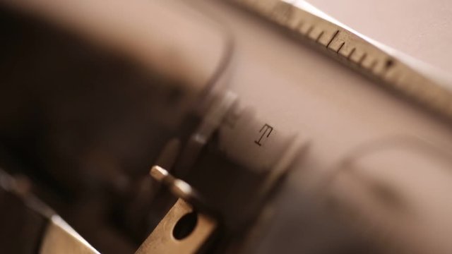 Writing Chapter Two on the retro old typewriter, close up view