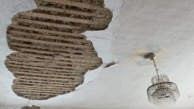 Collapsed old clay roof ceiling in a vintage house.