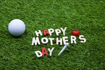 Golf Mother's Day with golf ball Happy mother's day with tee and heart with love on green grass
