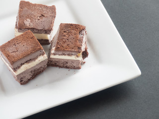 Homemade chocolate ice cream sandwiches cut into bite sized pieces