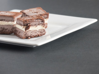 Homemade chocolate ice cream sandwiches cut into bite sized pieces