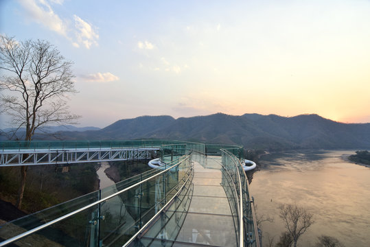 Beautiful Glass sky walk at Viewpoint new landmark Thailand skywalk, at Phra Yai Phu Khok Ngio Chiang Khan district, Loei Province, Mekong river Thailand and Laos PDR. of a popular tourist attraction