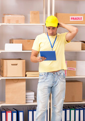 Handsome contractor working in box delivery relocation service