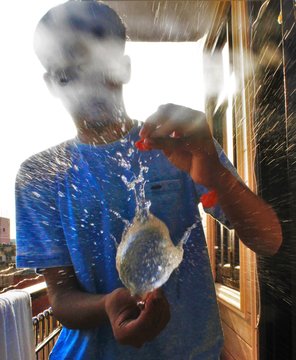 Man With Burst Water Balloon