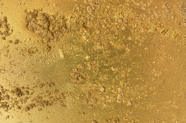 Golden dust background. Sparkling gold texture.