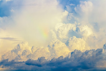 Naklejka na ściany i meble soft rainbow light on white and gray dust cloudy on blue sky