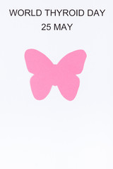Pink thyroid shape and inscription World Thyroid Day 25 May. Problems with thyroid. Copy space for text
