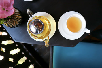 tea, tea pot and cups on the table