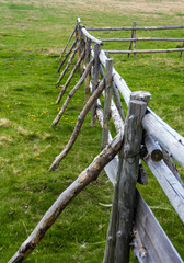 an old wooden fence in the field