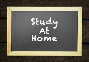 Obraz premium Study at home, words on blackboard.