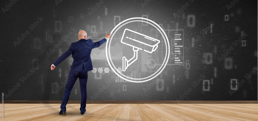 Poster businessman in front of a wall with security camera system icon and statistics data - 3d rendering