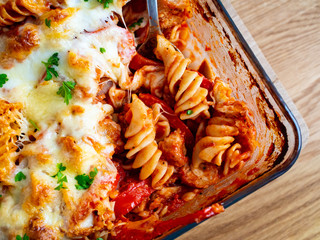 Pasta casserole with barbecue chicken breast, cheese and vegetables

