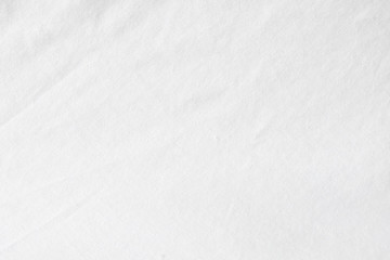 Wrinkled White fabric close up shot of good quality Cotton and polyester shirt. formal wear for office worker . Background texture concept with copy space for text.