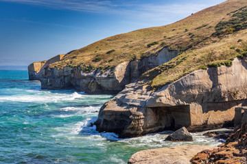 Fototapeta na wymiar Sandstone cliffs at Tunnel beach in New Zealand