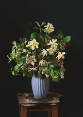 A bouquet of flowers in a vase on the table