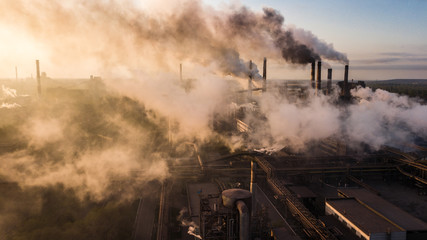 Fototapeta na wymiar industry metallurgical plant dawn smoke smog emissions bad ecology aerial photography