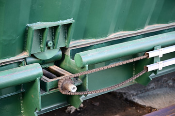 Photo of a chain mechanism in the open air. Universal concept.